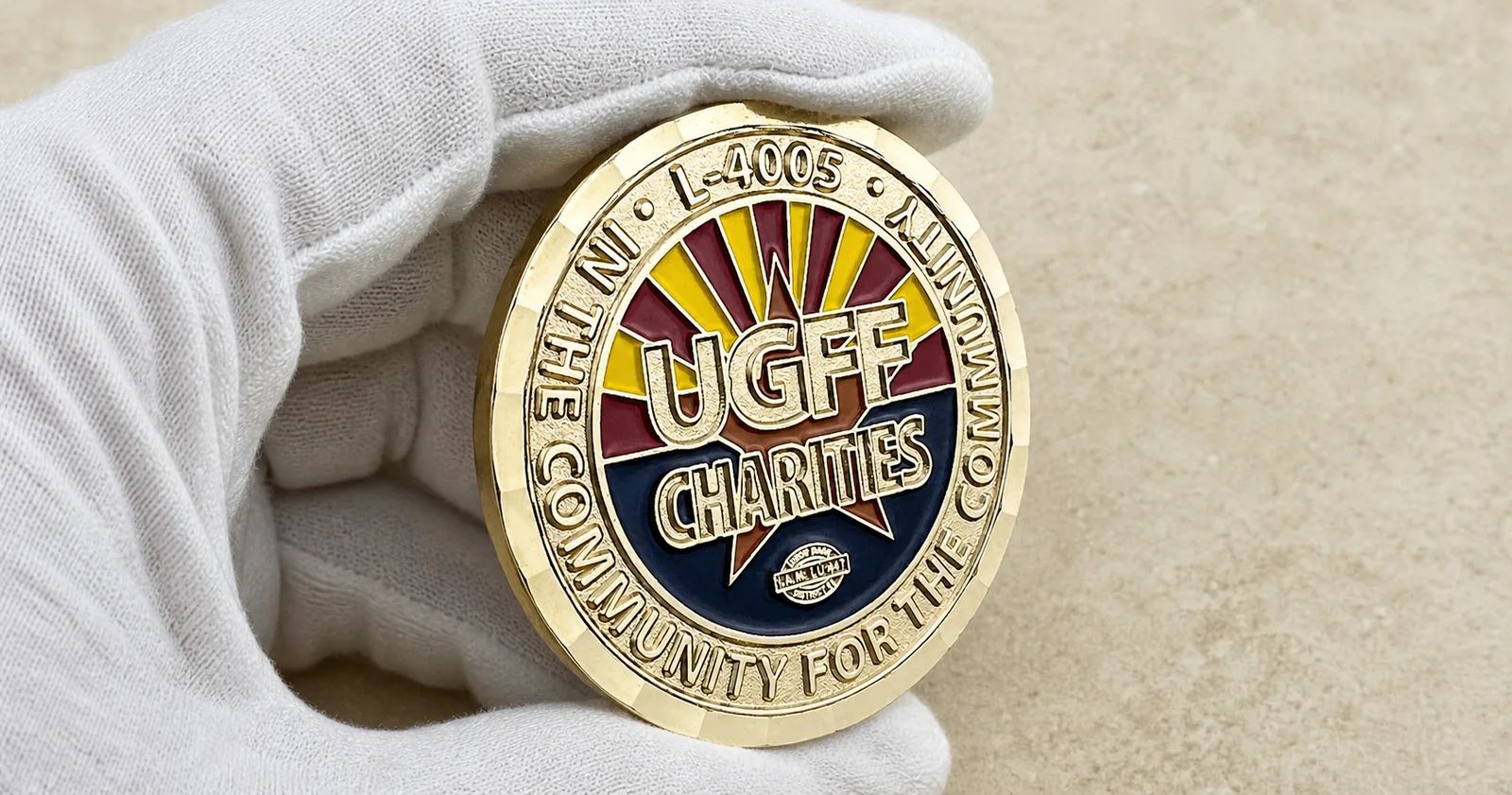 2D challenge coin with stepped raised lettering and recessed enamel color areas