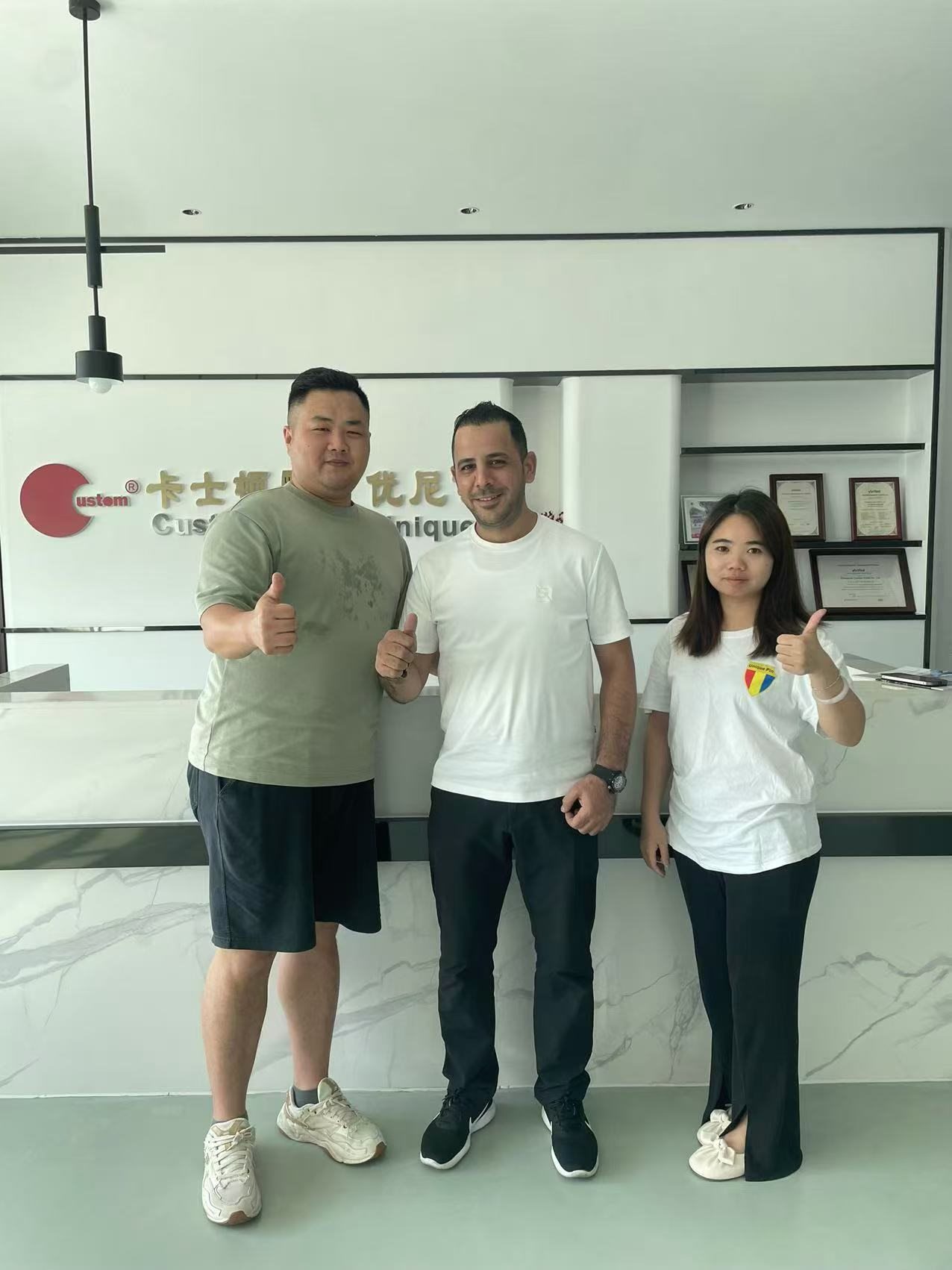 Customer visiting the Unique Pin office with our team