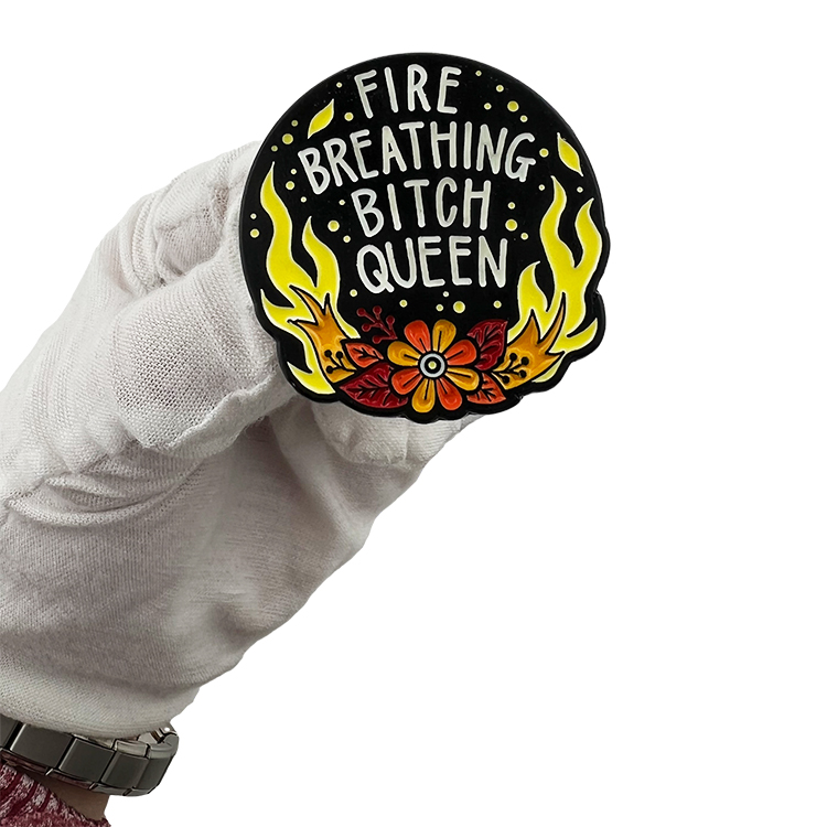 custom enamel pin close-up showing enamel colors and raised metal lines