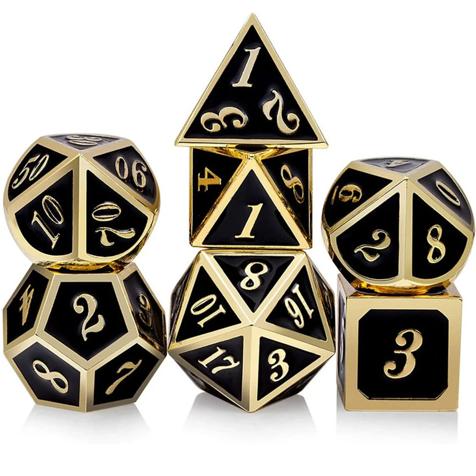 Black polyhedral role-playing dice with gold-tone edges and engraved numbers on a white background