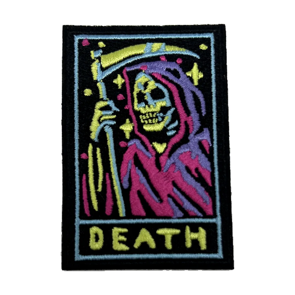 Custom embroidered death patch with skull and scythe artwork
