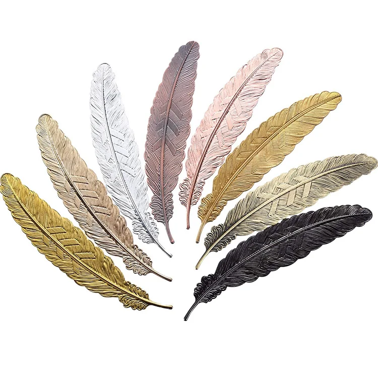 Eight detailed metal feather bookmarks in gold, silver, rose gold, bronze and black finishes on a white background