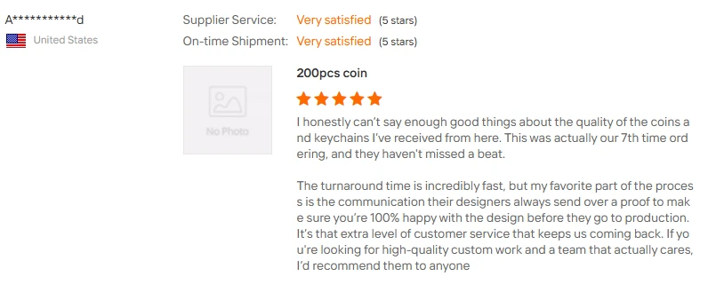 Customer review screenshot for a repeat custom coin and keychain order