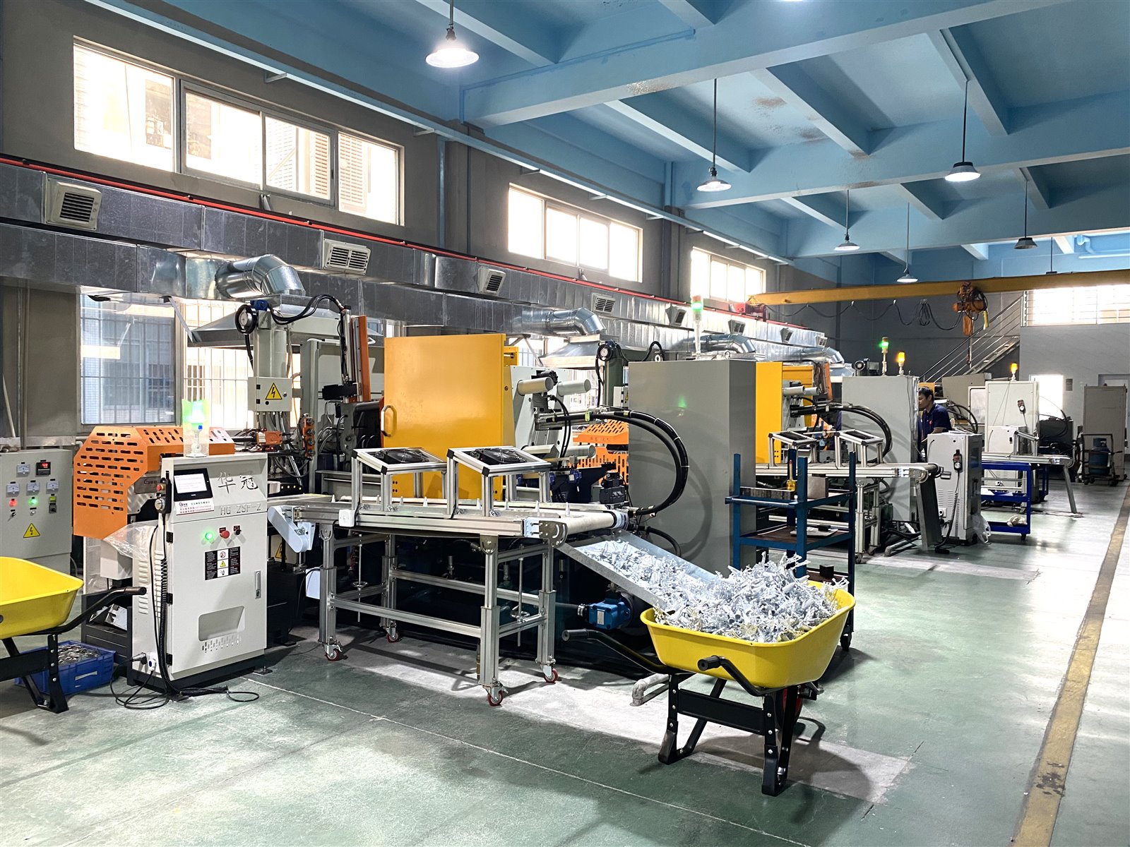 Automated metal production equipment inside the Unique Pin factory