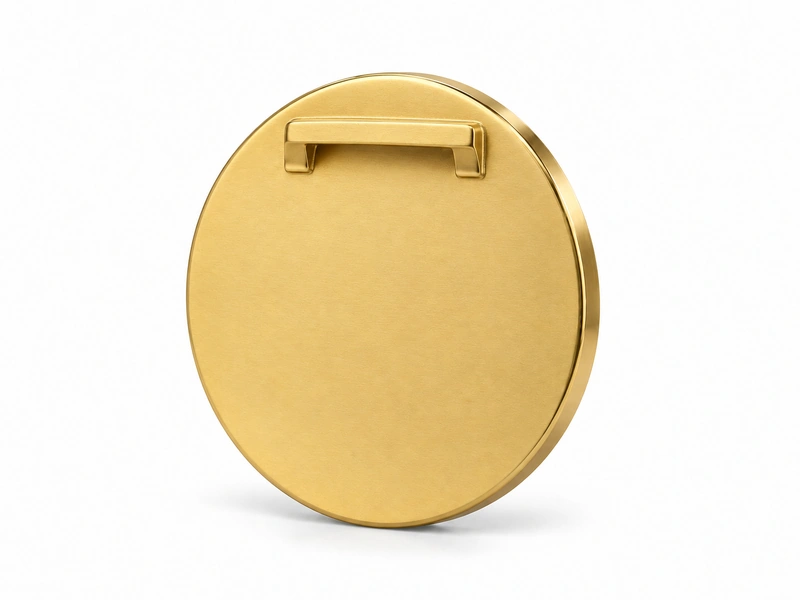 Back of a gold medal with a raised rear ribbon loop