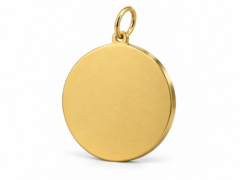 Gold medal with a separate jump ring through its top loop