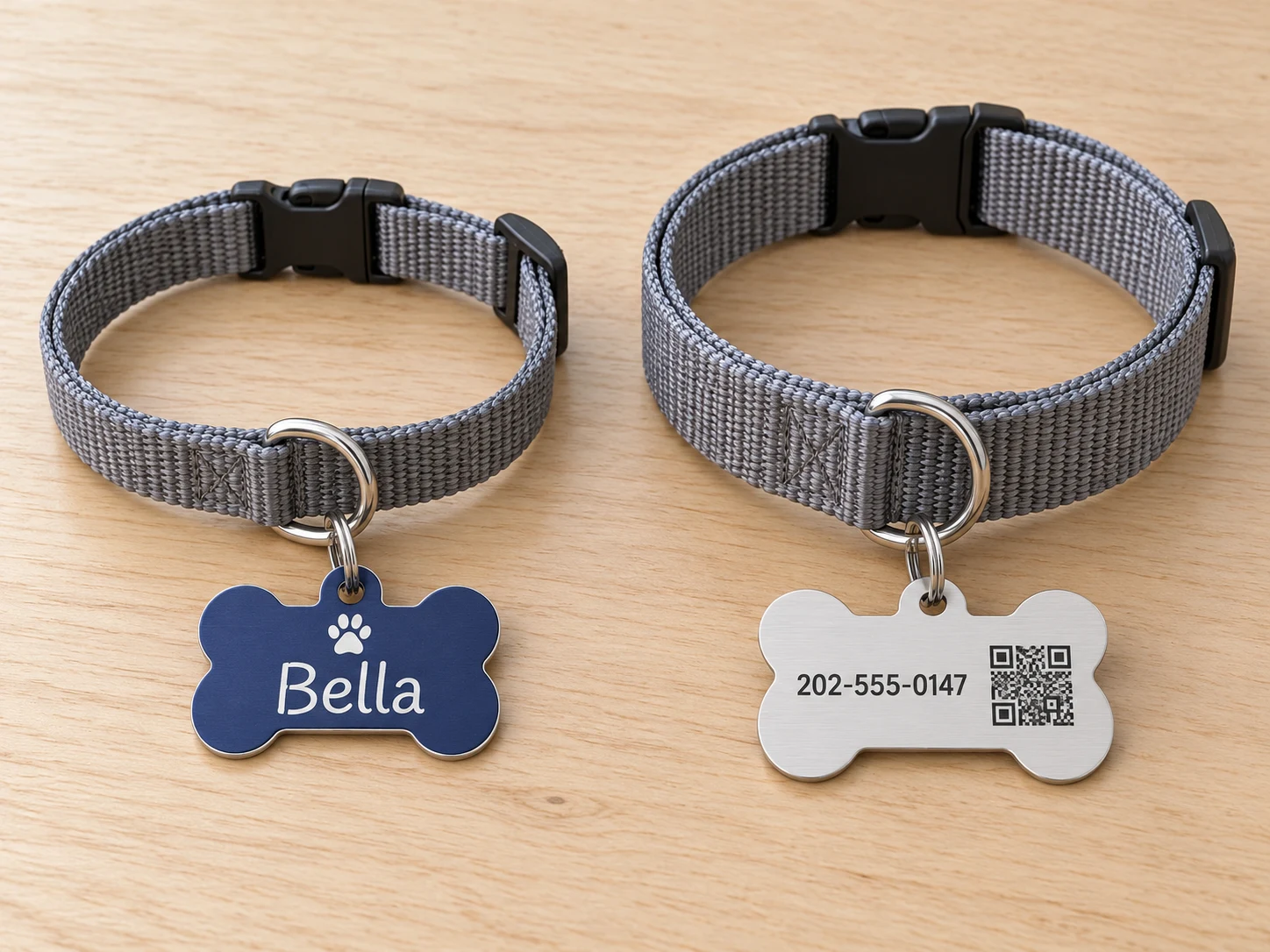Two sizes of the same pet tag design attached with connecting rings to collars of different widths.