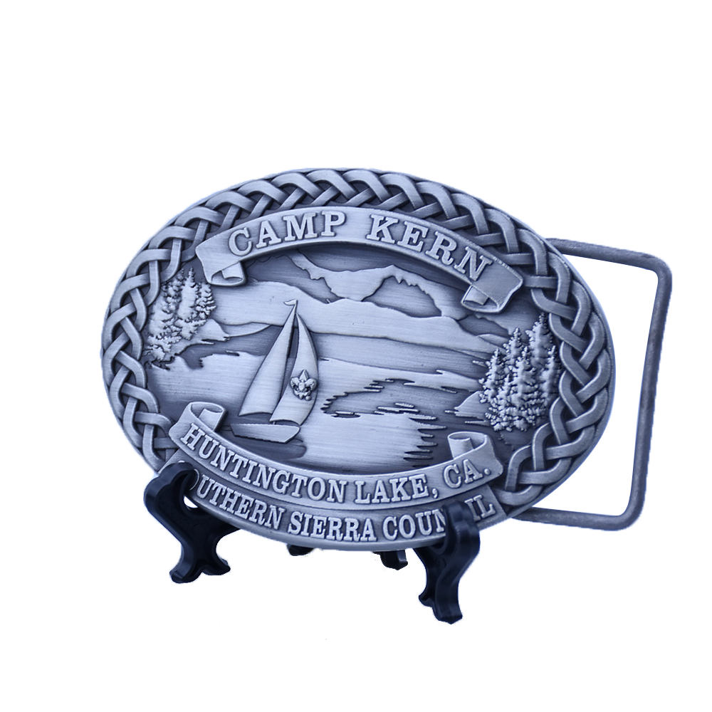 Oval relief logo metal belt buckle